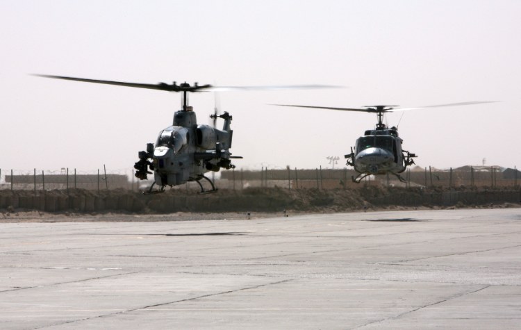 Image: AH-1W Super Cobra and a UH-1N Huey Helicopter