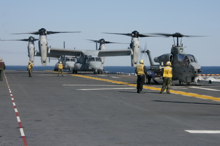 Image: Two MV-22B Ospreys, and an AH-1W Super Cobra